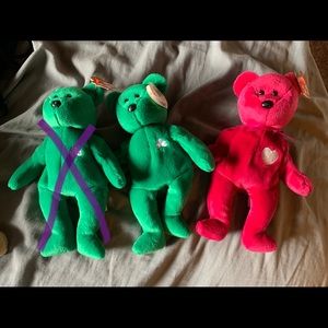 Ty beanie babies , good condition with their tags.  two Erin and one Valentino